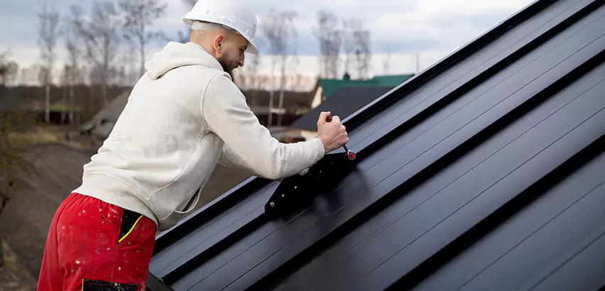 Tin Roof Ridge Cap Installation in Homer Glen